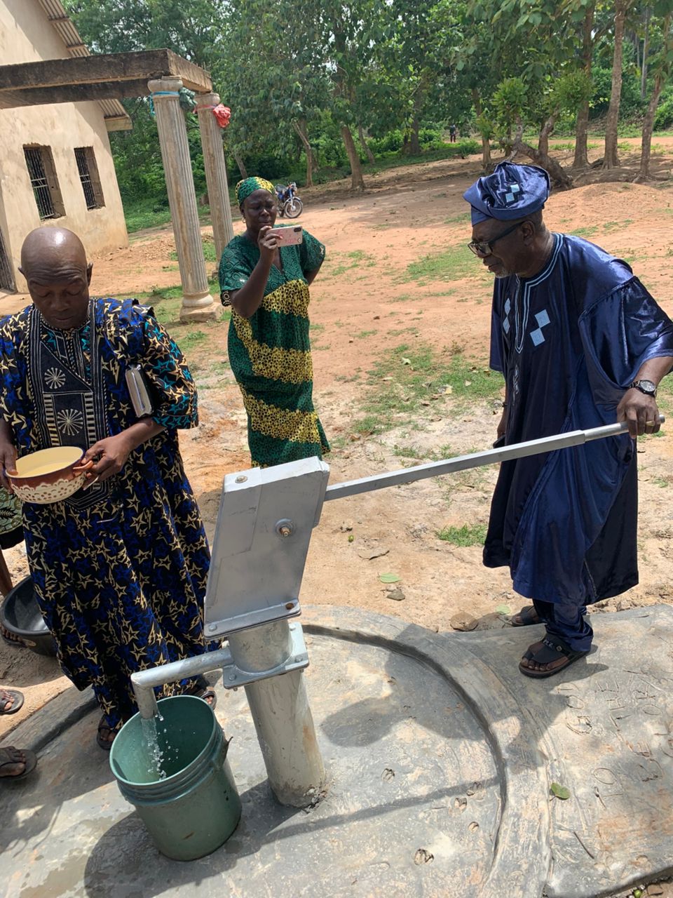 ALARA OF ARA KINGDOM, OBA DR. OLUBAYO ADESOLA WINDAPO, COMMISSIONS HAND DRILL BOREHOLE DONATED BY AMERICAN FRIENDS ASSOCIATION TO COMPLIMENT THE EFFORT OF ARA GROWTH AND DEVELOPMENT FOUNDATION (AGDF)